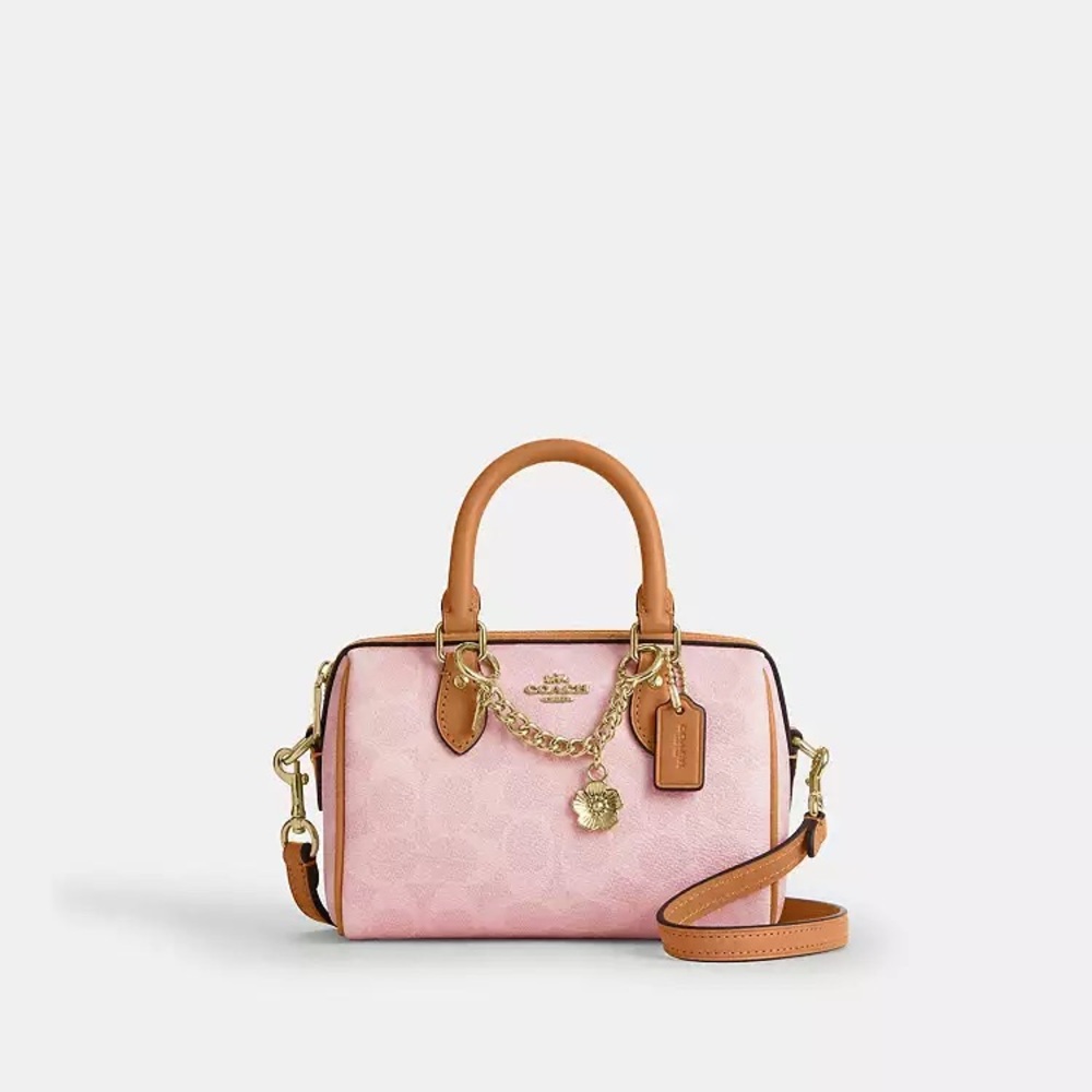 NWT Coach Mini Rowan Crossbody Bag
In Signature Canvas With Charms